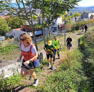 hash people climbing a suburban trail