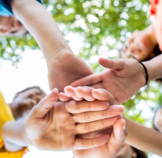 Kids stacking hands