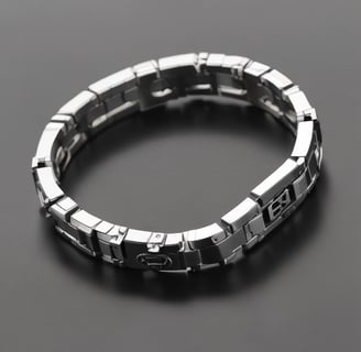 A close-up of a luxury watch with a silver and gold bracelet, featuring a gold bezel and a date display. The watch rests on a computer keyboard in an office setting, with a blurred background showing sunglasses, headphones, and a decorative pyramid.