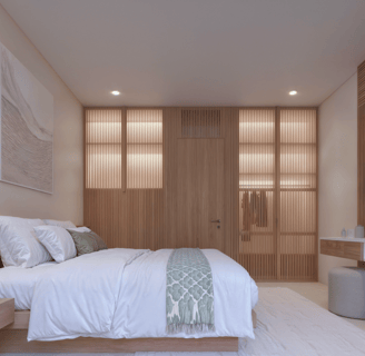 Bed view inside Villa Oraya, combining minimalist design with warm textures and calming Bali vibes