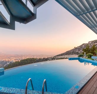 Luxury infinity pool in San Mateo backyard with scenic views, built by custom pool contractors
