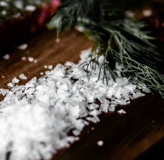 salt and dill on a wooden board