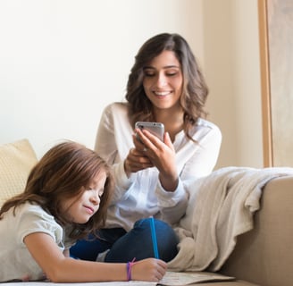mom using app on her smartphone