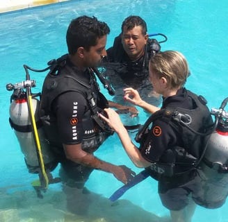 a group of scuba divers in a pool master dive course at sunrise dive bali