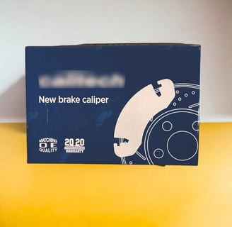 Corrugated folding carton for new brake caliper