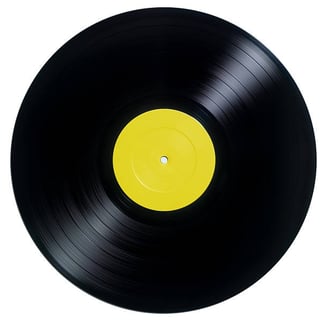 a vinyl record with a yellow label on it