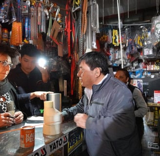 a man standing in front of a counter top