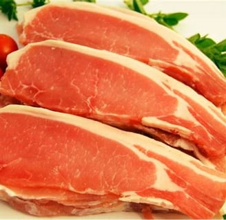 a plate of meat and vegetables on a plate