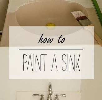 a sink with a green paint job on it and a white sink
