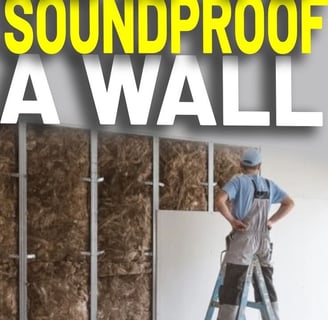 a man standing on a ladder ladder to get a soundproofed sound