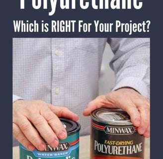 a man holding a paintbrush and a paintbrush next to a canister of
