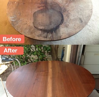 a table with a wooden table top and a table with a chair
