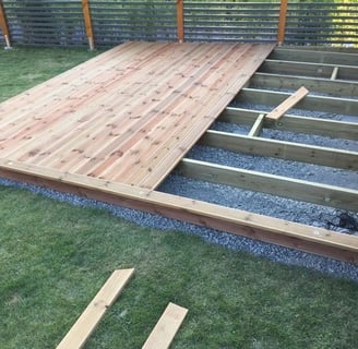 a deck deck with a deck and stairs
