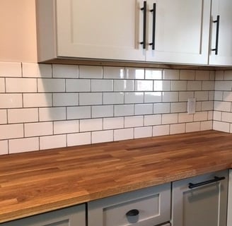a kitchen counter top with a wooden counter top