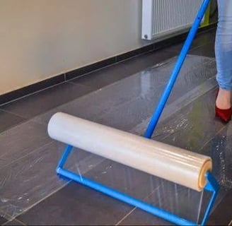 a woman in red shoes and a blue plastic bag