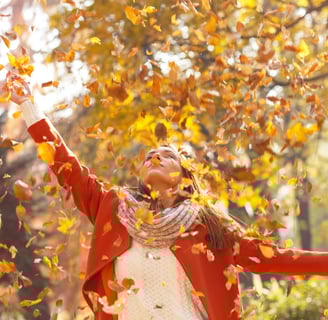 Throwing leaves in the air 