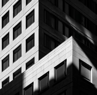 Shadowed corner of a modern office building.