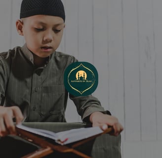 Young Muslim boy reciting Quran from a wooden stand, , with Alphabets Of Islam logo overlayed.