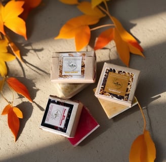 Assorted handmade soap bars with floral accents – natural skincare by Thitiksha Organique