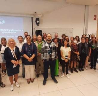 a group of people standing in front of a presentation