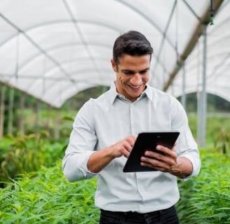 Happy hydroponics farmer free from his worries because AI is handling things for him 24x7