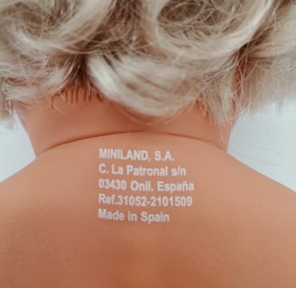 Marking on the back of a Miniland doll