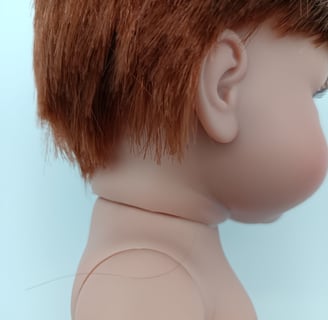 Dolls hair badly cut