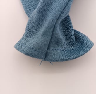 Flaws in stitching hem not matching up