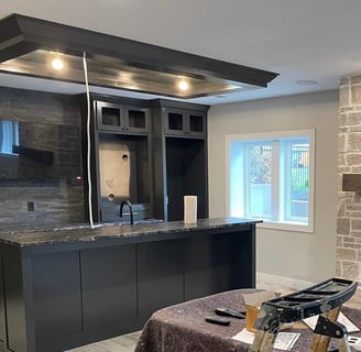 Complete Cabinets and Island Painted Black for a Modern, Sleek Finish