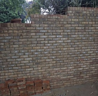 Brick retaining wall cleaning in Russellville, Tn 37860 by Bobs Pressure Washing Services