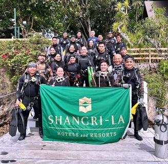 Group photo in the jetty port before scuba diving