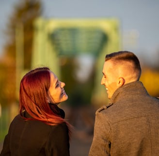a man and woman standing next to each other