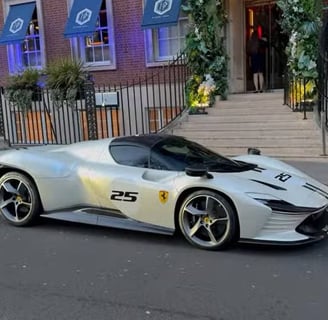 Rare Ferrari Daytona SP3 parked outside Lucky Cat Mayfair in London.