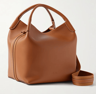 Luxury tan leather handbag with a structured silhouette and contrast stitching.