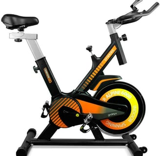 a stationary bike with a black and orange bike