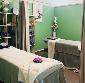 Clean and peaceful massage room at Ashburton Thai Massage & Spa with traditional Thai decor