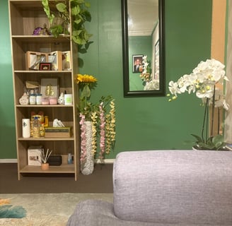 Reception area of Ashburton Thai Massage & Spa featuring a welcoming desk, comfortable seating, and
