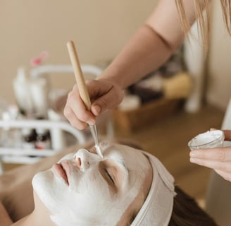 facial mask application on womens face