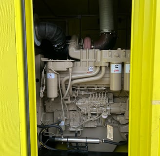 a yellow truck with a large engine and a large engine