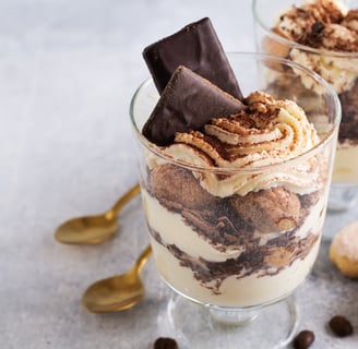 a dessert with chocolate chips and a cookie
