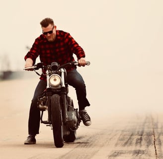 man doing a burnout on his motorcycle