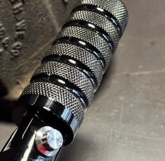 black knurled foot peg