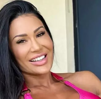 a woman in a pink bikini top and a pink braGRACIANE BARBOSA