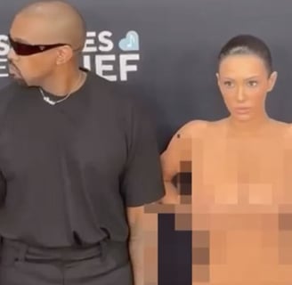 a man and woman standing next to each other