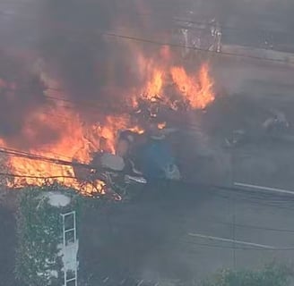 a fire that is burning in the middle of a street