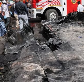 a fire truck is parked in a lot