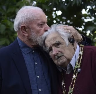 a man and woman standing next to each other