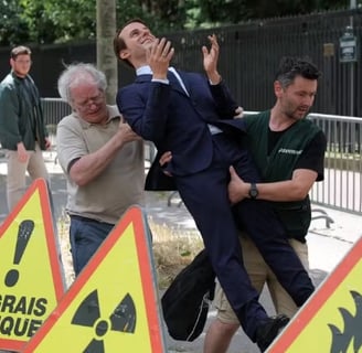 a man in a suit and tie is being carried by a man in a suit