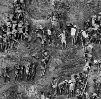 a group of people standing on a hill side