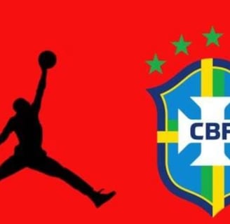 a man jumping up to a basketball ball